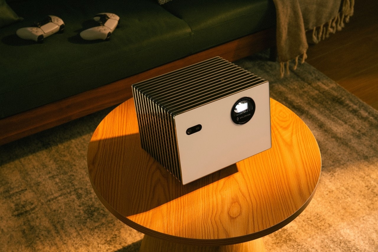 A laser projector on the desk.