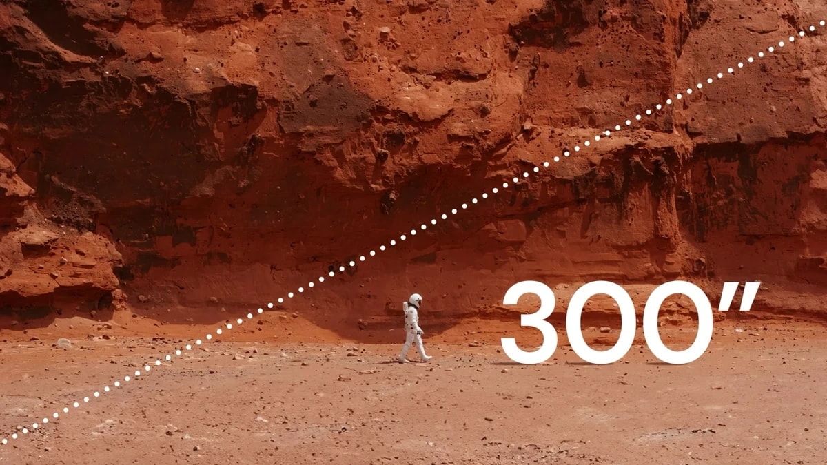 Projecteur affichant une image immersive de 300 pouces sur un grand mur, avec un astronaute à l'écran.