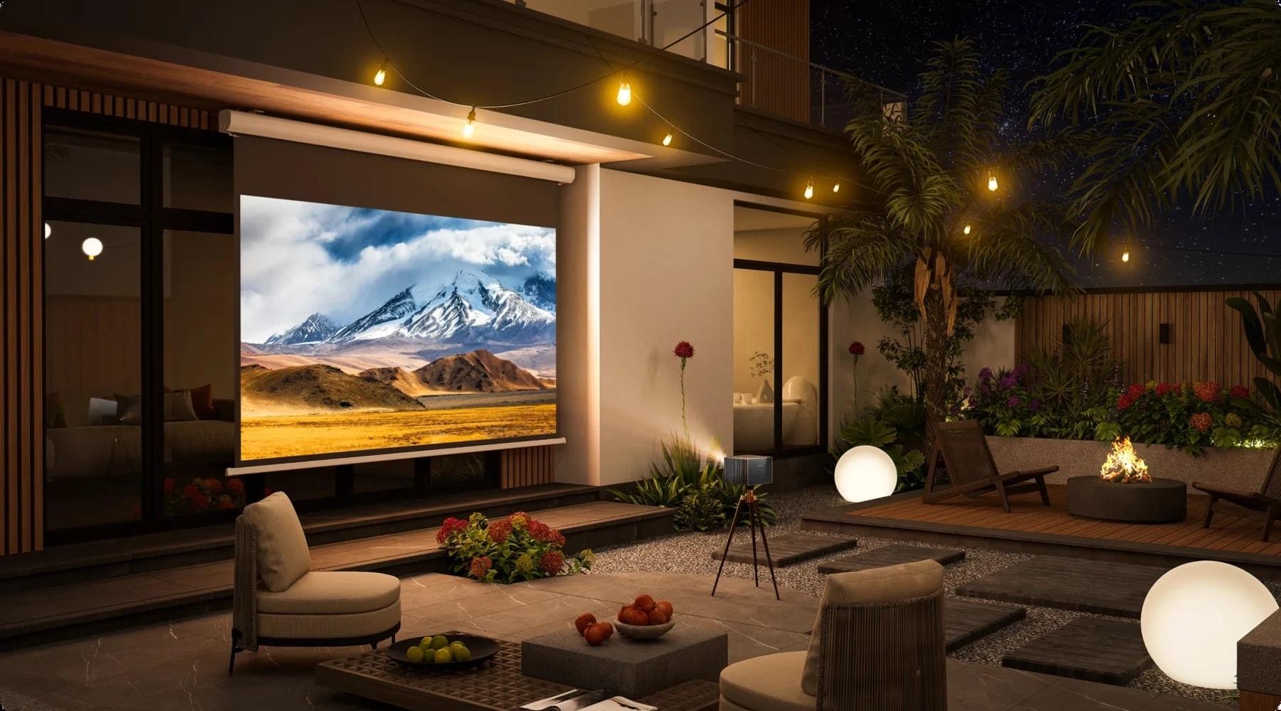 Outdoor-Kino mit Camping-Beamer, Leinwand und Sitzbereich bei Nacht.