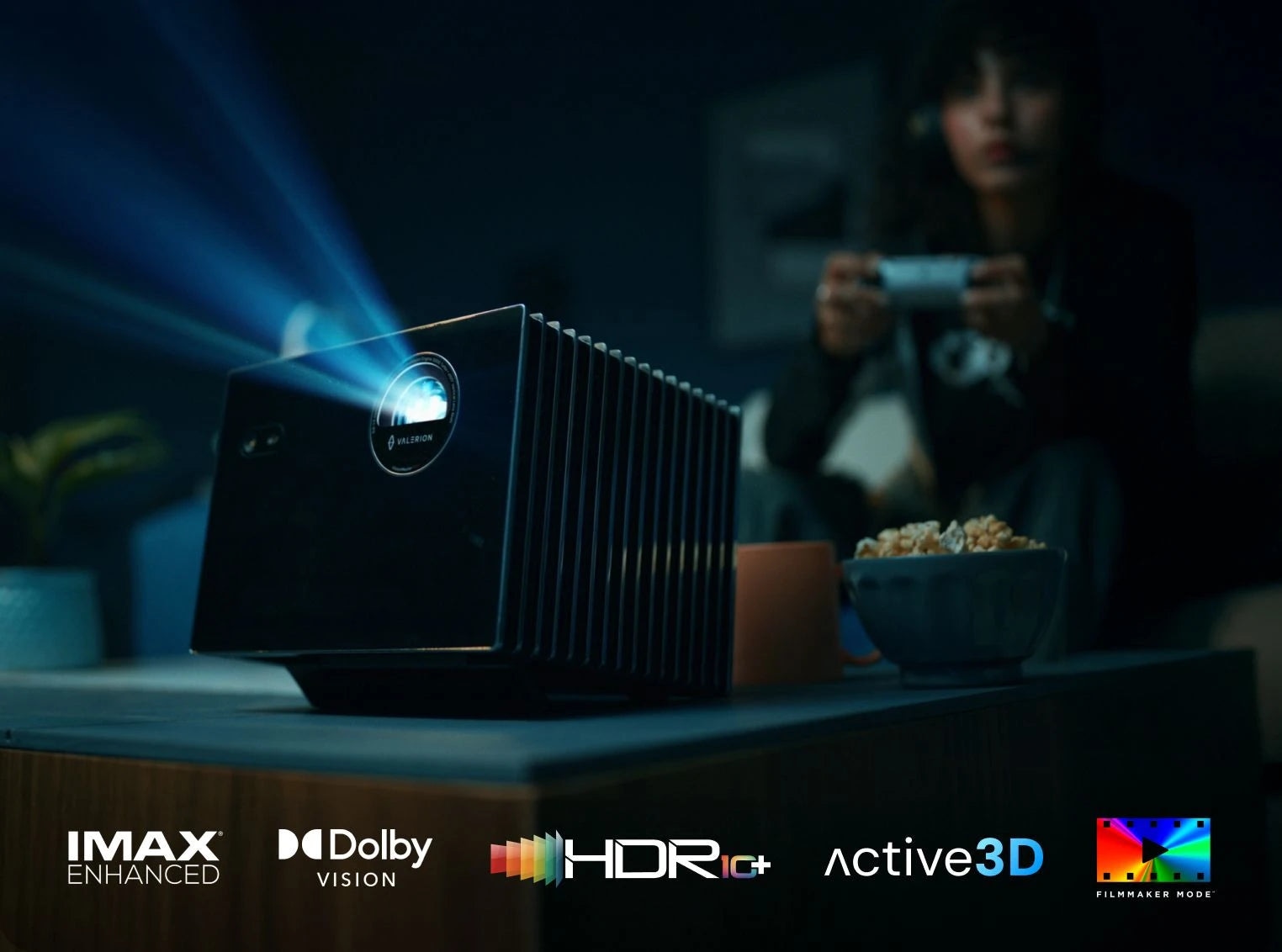 Valerion VisionMaster Max in dark room projecting image during game night.