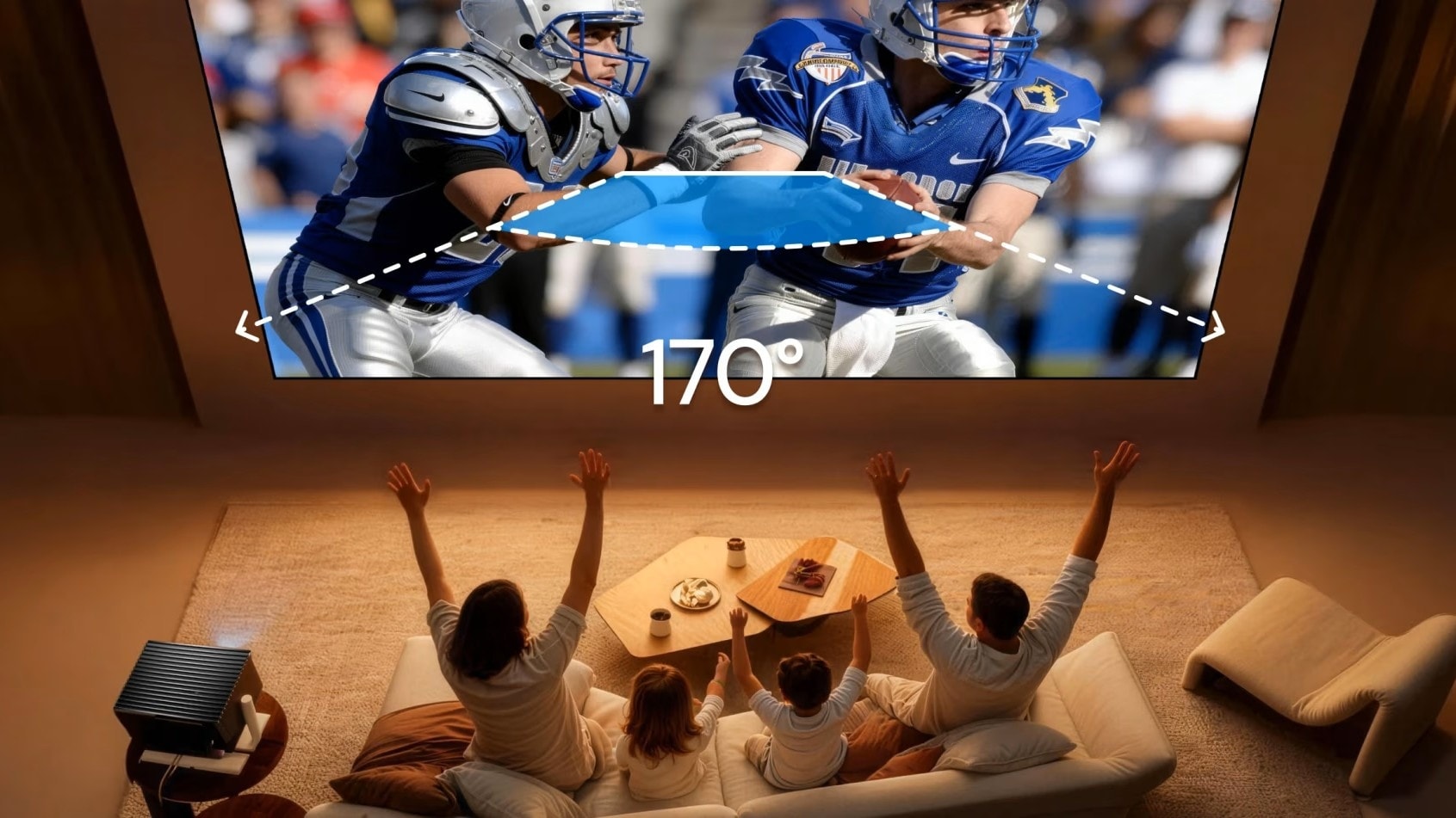 A family sat on a big screen watching an NFL game using a projector.